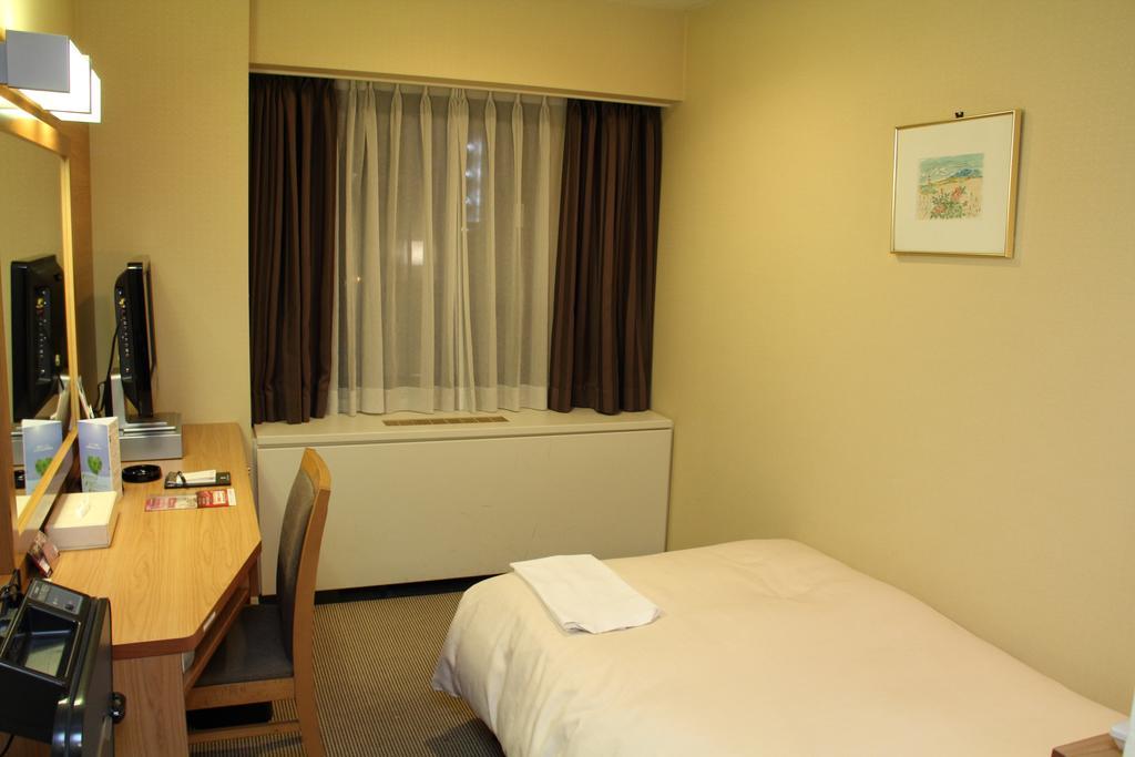 Hotel Sunroute New Sapporo Quarto foto