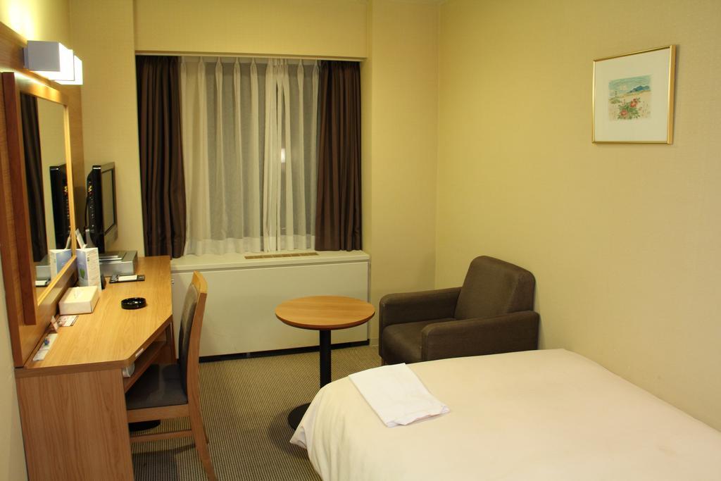 Hotel Sunroute New Sapporo Quarto foto