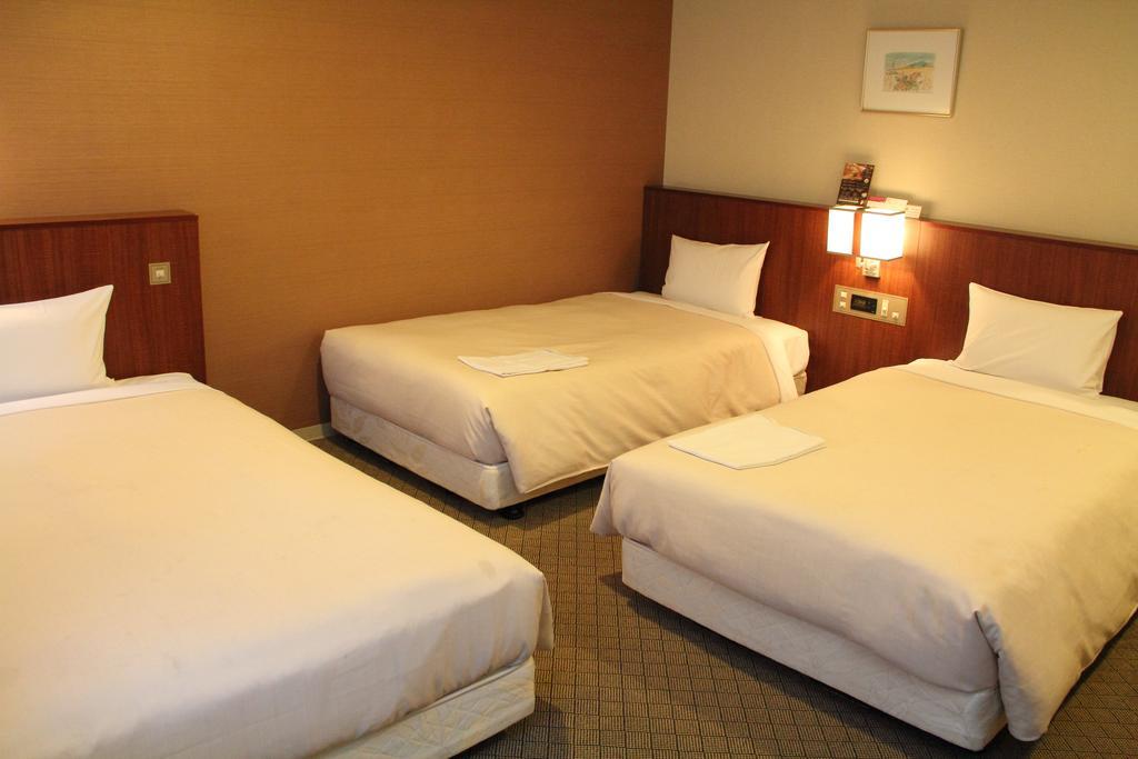 Hotel Sunroute New Sapporo Quarto foto