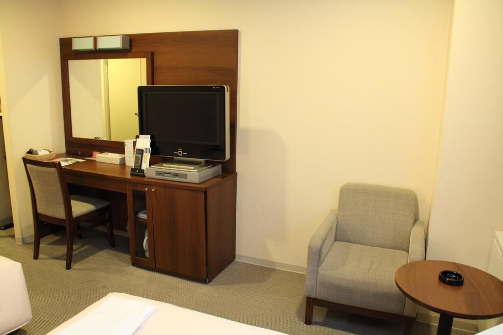 Hotel Sunroute New Sapporo Quarto foto